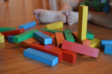 Child playing with blocks fallen over generic