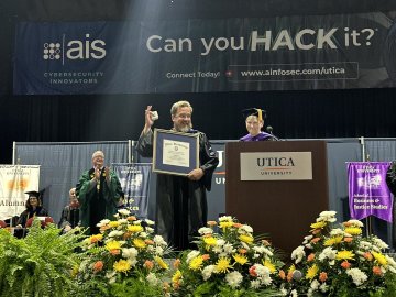 Dr Adam Pack receives the 2024 Crisafulli Award