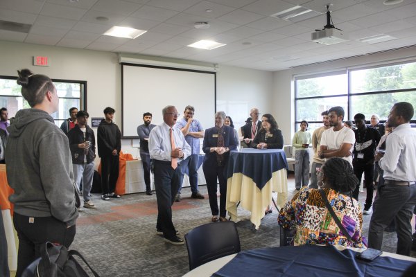 President Todd Pfannestiel and Provost Stephanie Nesbitt welcome incoming International students to Utica University.